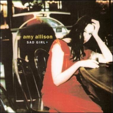 A person sitting at a table
Description automatically generated