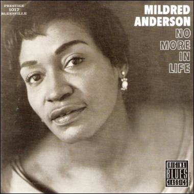 A person with short hair
Description automatically generated