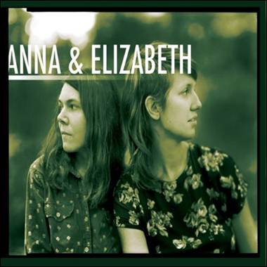 A couple of women looking back to back
Description automatically generated