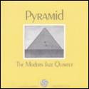 A yellow cover with a picture of a pyramid

Description automatically generated