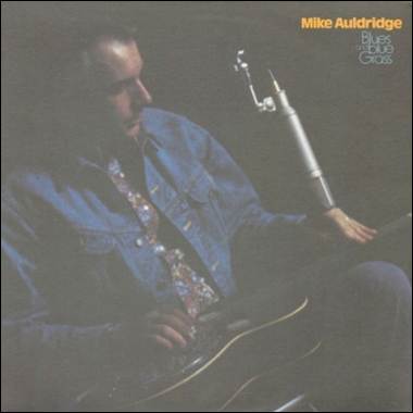 A person sitting in front of a microphone
Description automatically generated