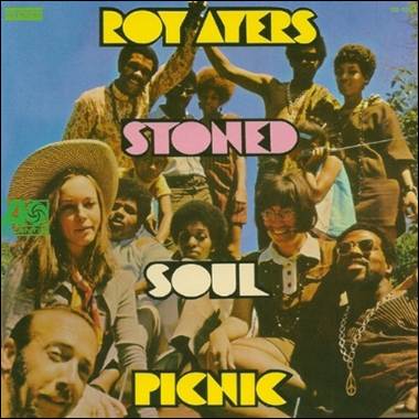 A group of people posing for a photo
Description automatically generated