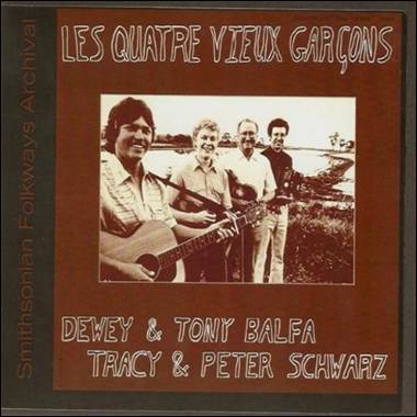 A group of men holding guitars
Description automatically generated