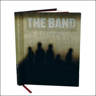 A book with shadows on it
AI-generated content may be incorrect.