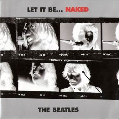 A person with long hair and a microphone
Description automatically generated