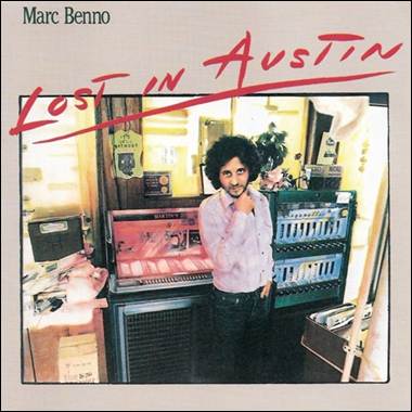 A person standing in front of a record player
Description automatically generated