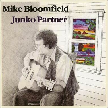 A person sitting on a chair playing a guitar

Description automatically generated