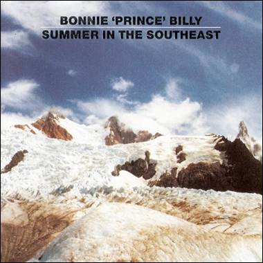 A mountain with snow and clouds

Description automatically generated