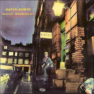 A person standing in the street
Description automatically generated