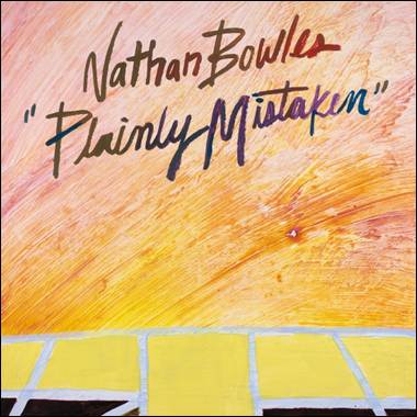 A painting of a yellow and black square
Description automatically generated