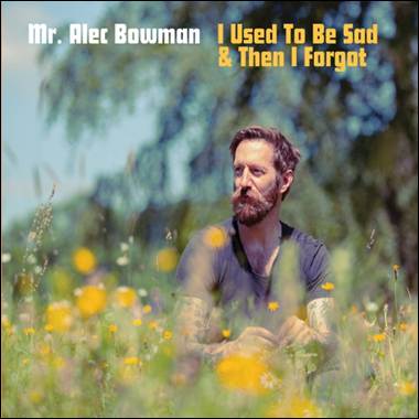 A person sitting in a field of flowers
Description automatically generated