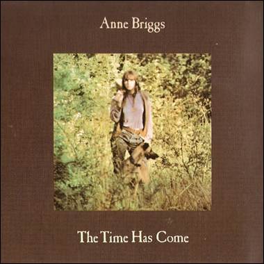 A person standing in a field
Description automatically generated