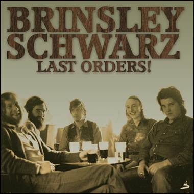 A group of people sitting at a table
Description automatically generated