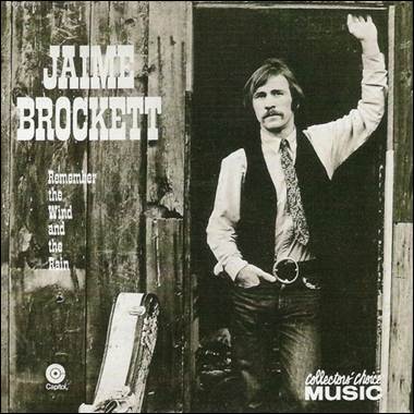 A person standing in a doorway

Description automatically generated