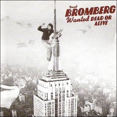 A person on top of a skyscraper
Description automatically generated