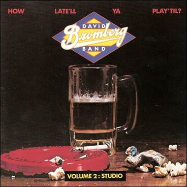 A glass of beer and cigarette butts
Description automatically generated