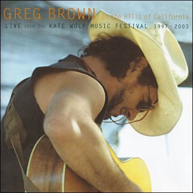 A person in a cowboy hat playing a guitar
Description automatically generated