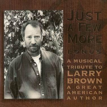 A person in a black and white photo
Description automatically generated