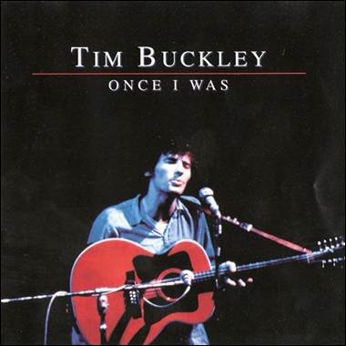 A person playing a guitar
Description automatically generated