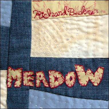 A close-up of a patchwork
Description automatically generated