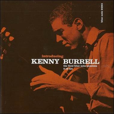 A person playing a guitar
Description automatically generated