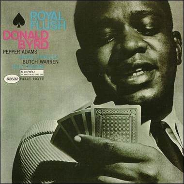 A person holding playing cards
Description automatically generated