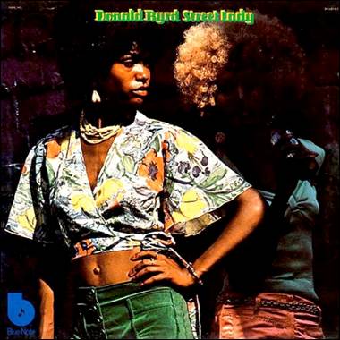 A person standing with her hands on her hips
Description automatically generated