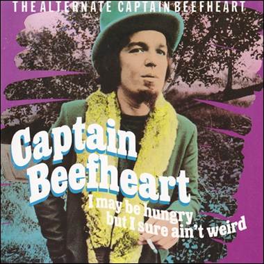 A person in a hat and scarf
Description automatically generated