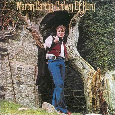 A person standing in a doorway
Description automatically generated