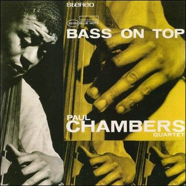 A person playing a cello
Description automatically generated