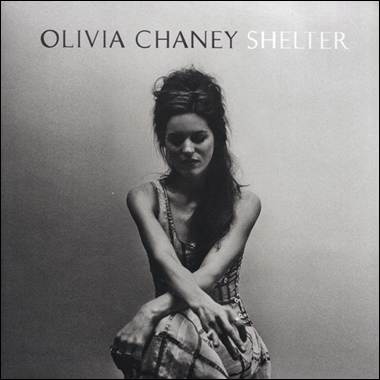 A person sitting on a stool
Description automatically generated