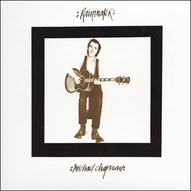 A person holding a guitar
Description automatically generated