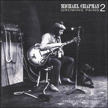 A person playing a guitar
Description automatically generated