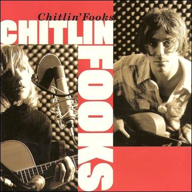 A group of men playing guitars
Description automatically generated