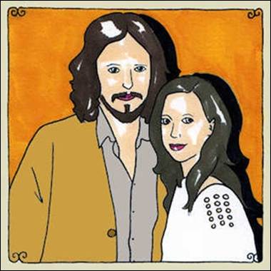 A person and person with long hair
Description automatically generated