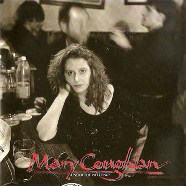 A person sitting at a table
Description automatically generated