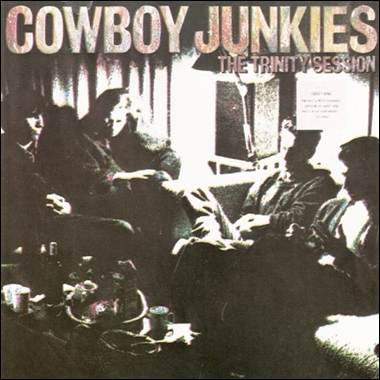 A group of people sitting on a couch

Description automatically generated