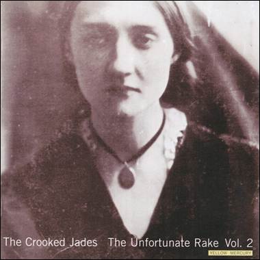 A person with a necklace
Description automatically generated