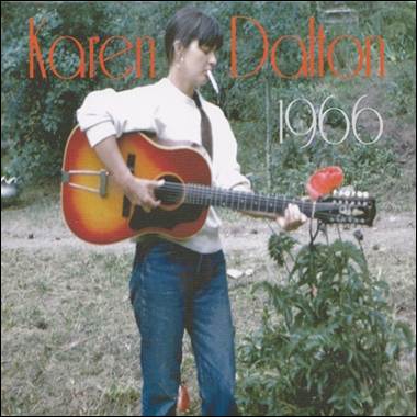 A person holding a guitar

Description automatically generated