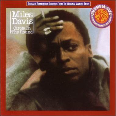 A person with his hand on his head

Description automatically generated