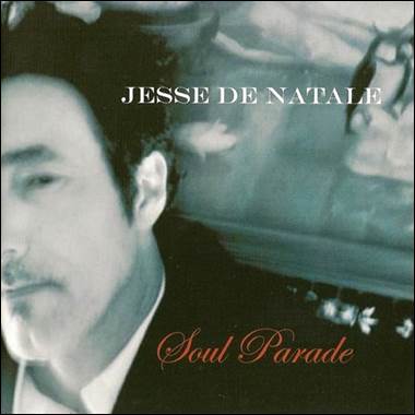 A person with a mustache and a beard
Description automatically generated