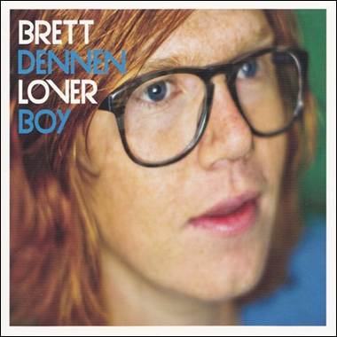 A close-up of a person wearing glasses
Description automatically generated