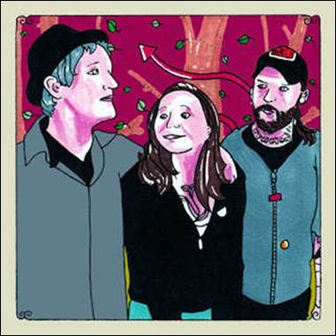 A group of people standing together
Description automatically generated