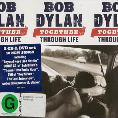 A group of people in a car

Description automatically generated