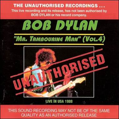 A person playing guitar on a red cover

Description automatically generated