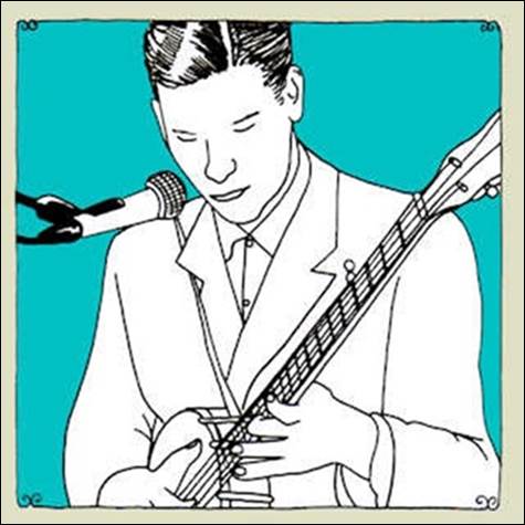 A person playing a guitar
Description automatically generated