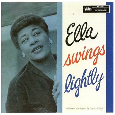 A person with earring and earrings
Description automatically generated