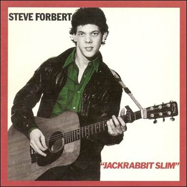 A person holding a guitar

Description automatically generated