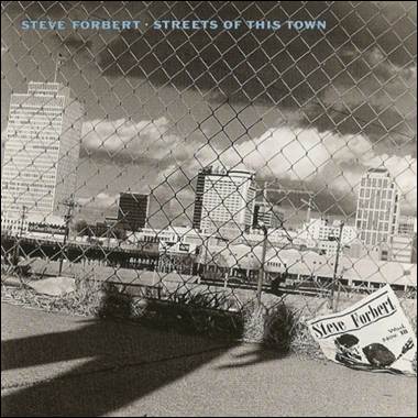 A sign on the ground behind a fence
Description automatically generated