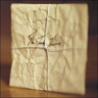 A close-up of a letter
Description automatically generated